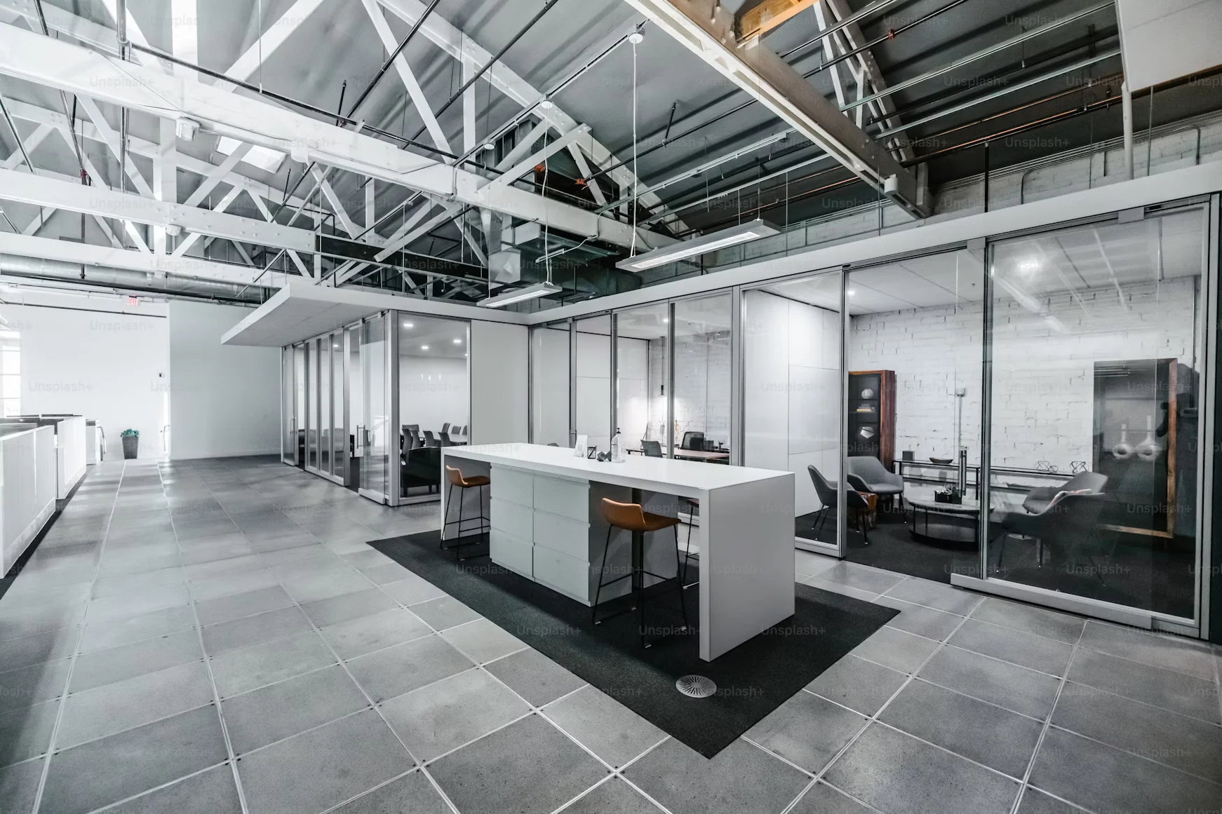 the interior of the office space in white-grey colors.